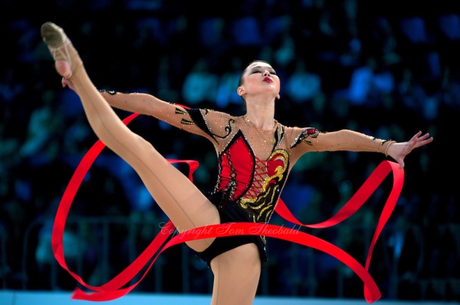 ALINA MAKSYMENKO of Ukraine performs on way to winning 3 of 4 Event Finals at 2011 World Cup Kiev, 